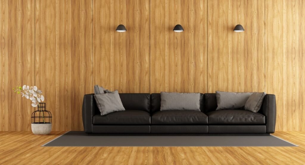 modern-black-sofa-in-room-with-wood-wall-2026-03-16-04-28-29-utc1